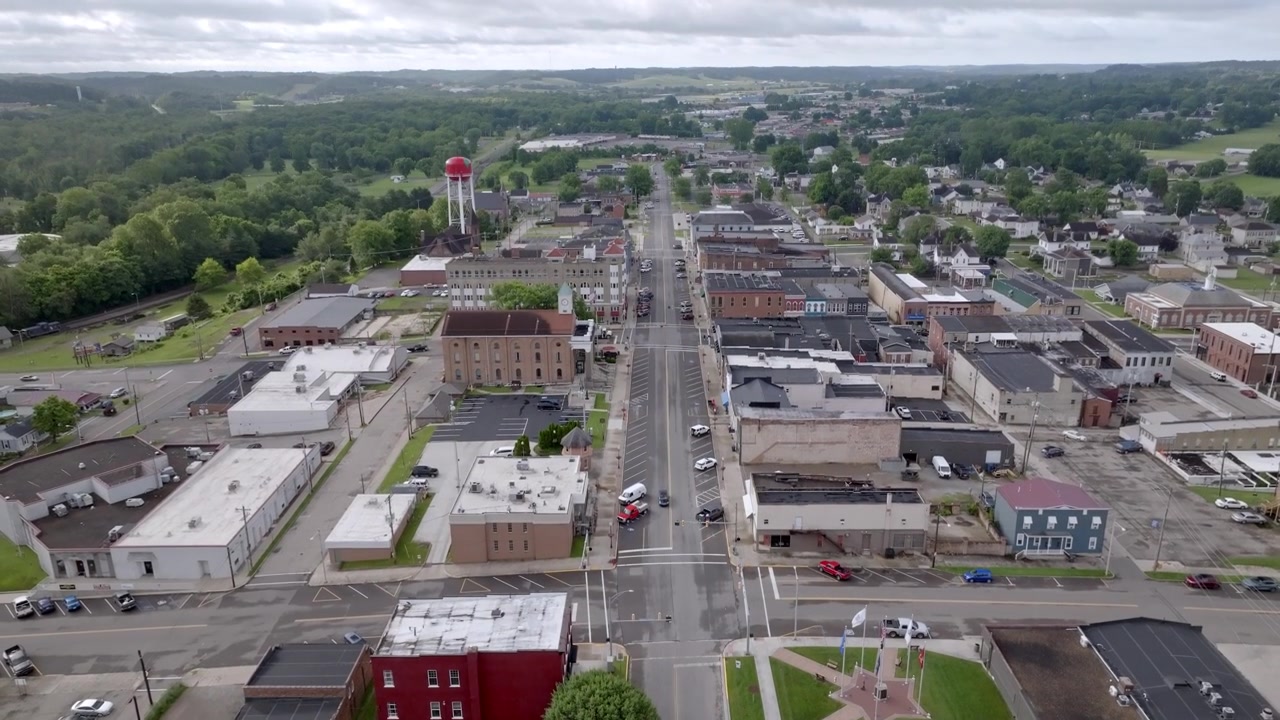 Jackson, Ohio downtown with drone video moving up.