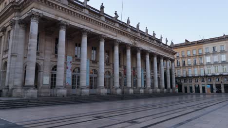 opera of bordeaux and place de la comédie empty with nobody during sunrise, wide truck left