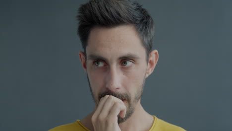 man looking pensive and anxious