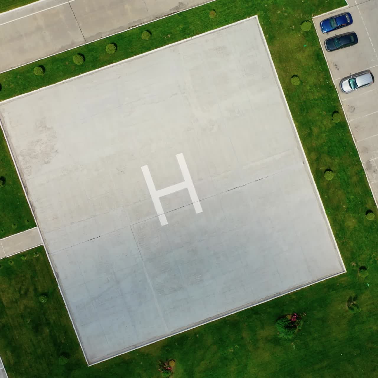 Helicopter landing site. Aerial view of a large modern industrial factory