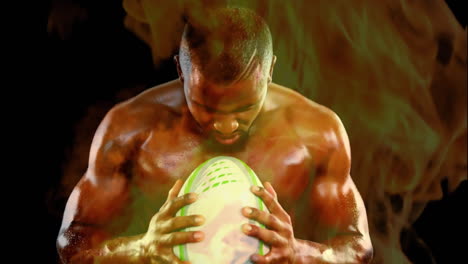 rugby player holding football and screaming