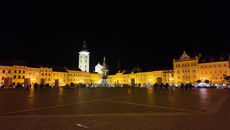 illuminated historic town square at night