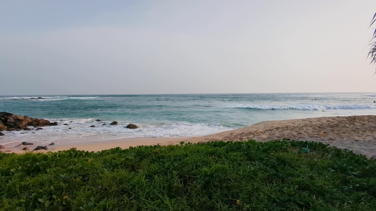 Scenic coastal view of ocean surf waves on south coast of Sri Lanka