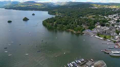 cinematic aerial view of bowness-on-windermere