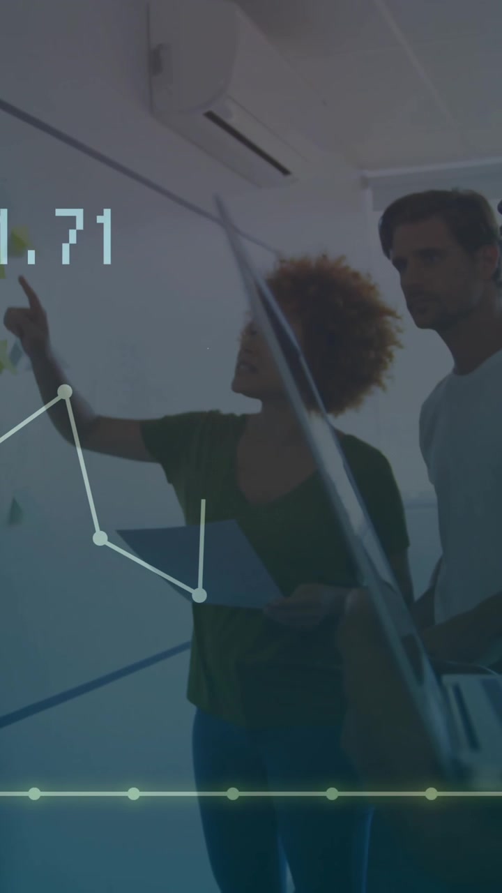 Business team brainstorming with graph animation over meeting room scene