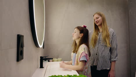 sisters getting ready together