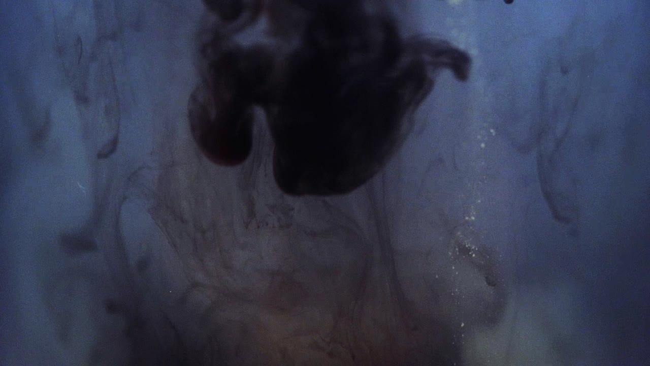 Paint floating in water looking like majestic nebulas. Stable shot with the Sony a7iii