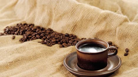 black coffee served on sack with coffee beans