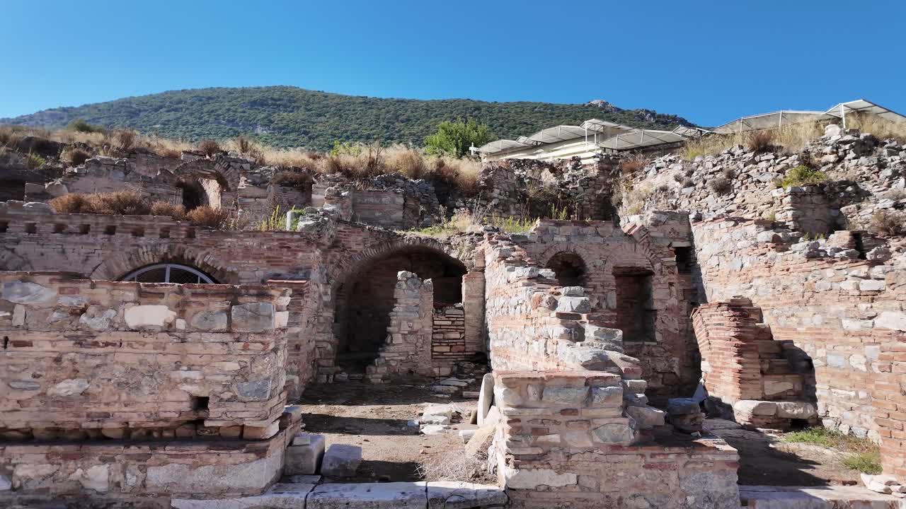 ruins of market stalls that once housed and sold goods for sale in the great city of Ephesus, Turkey