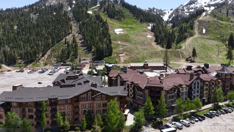 drone shot of palisades ski resort on summer day, olympic village, lake tahoe, california usa
