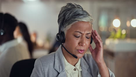 Call-center,-night-and-senior-woman-with-stress