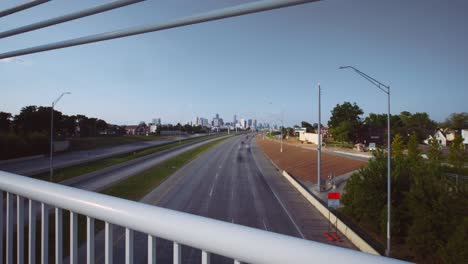 Wide angle view Downtown Houston Skyline with 288 Freeway Traffic