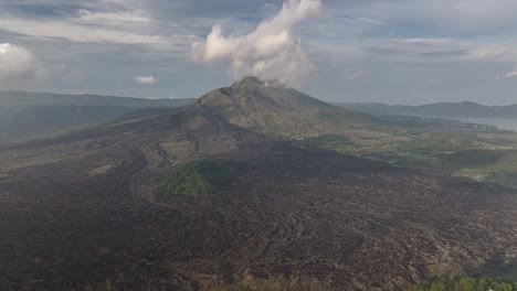 mount batur in bali, indonesia. birds eye view of active volcano and volcanic landscape.