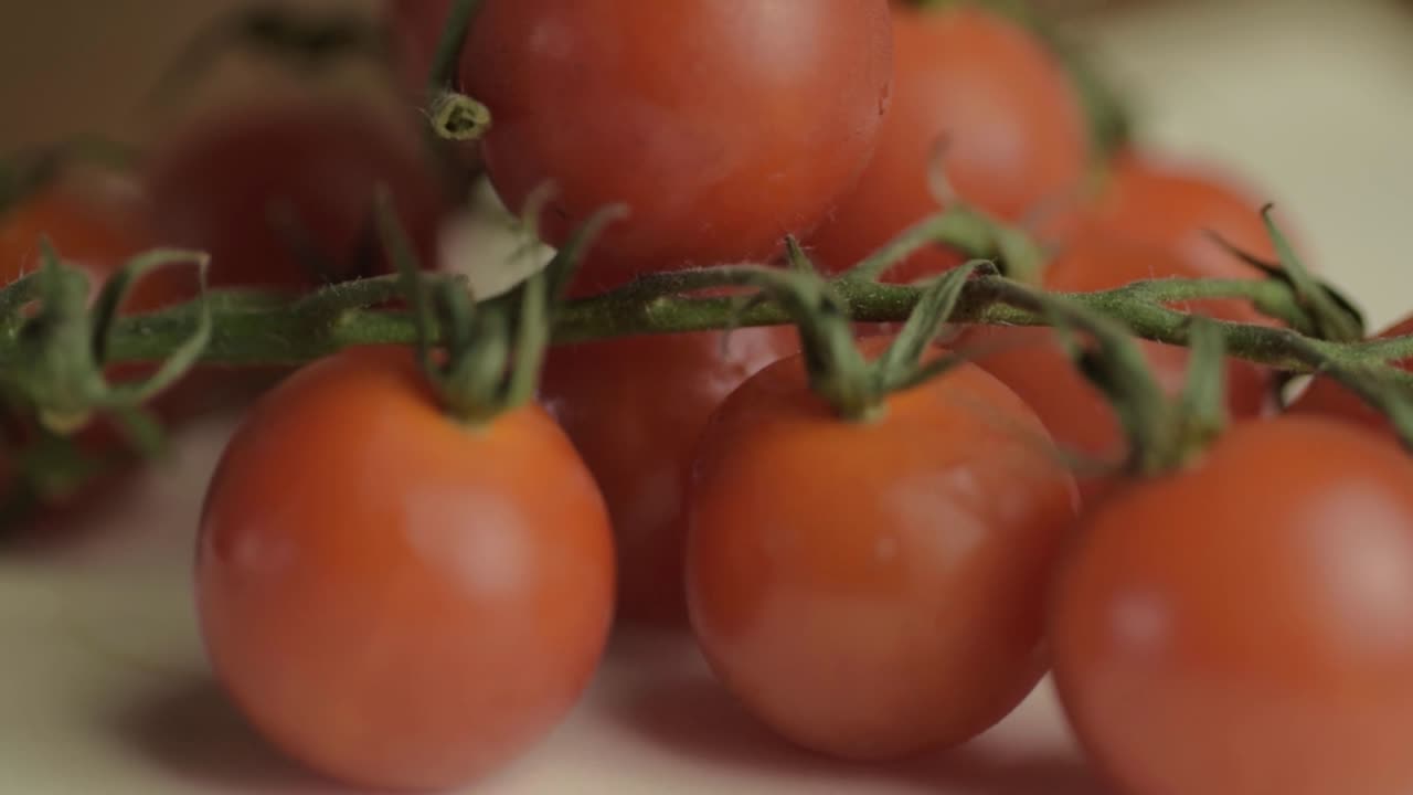 Cherry vine tomatoes rotating close up shot