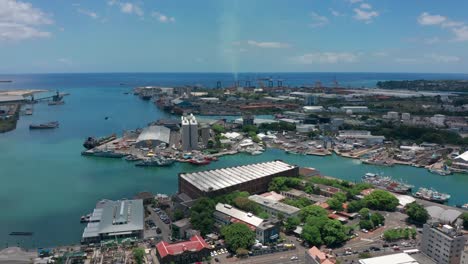 aerial view port louis on beautiful sunny day. capital of the island of mauritius. tall buildings on the indian ocean. offshore banking system