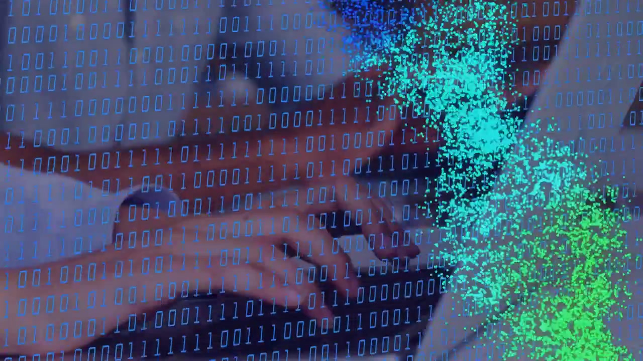 Hands pressing keys on laptop, binary overlay, particles forming helix then dispersing, showing DNA