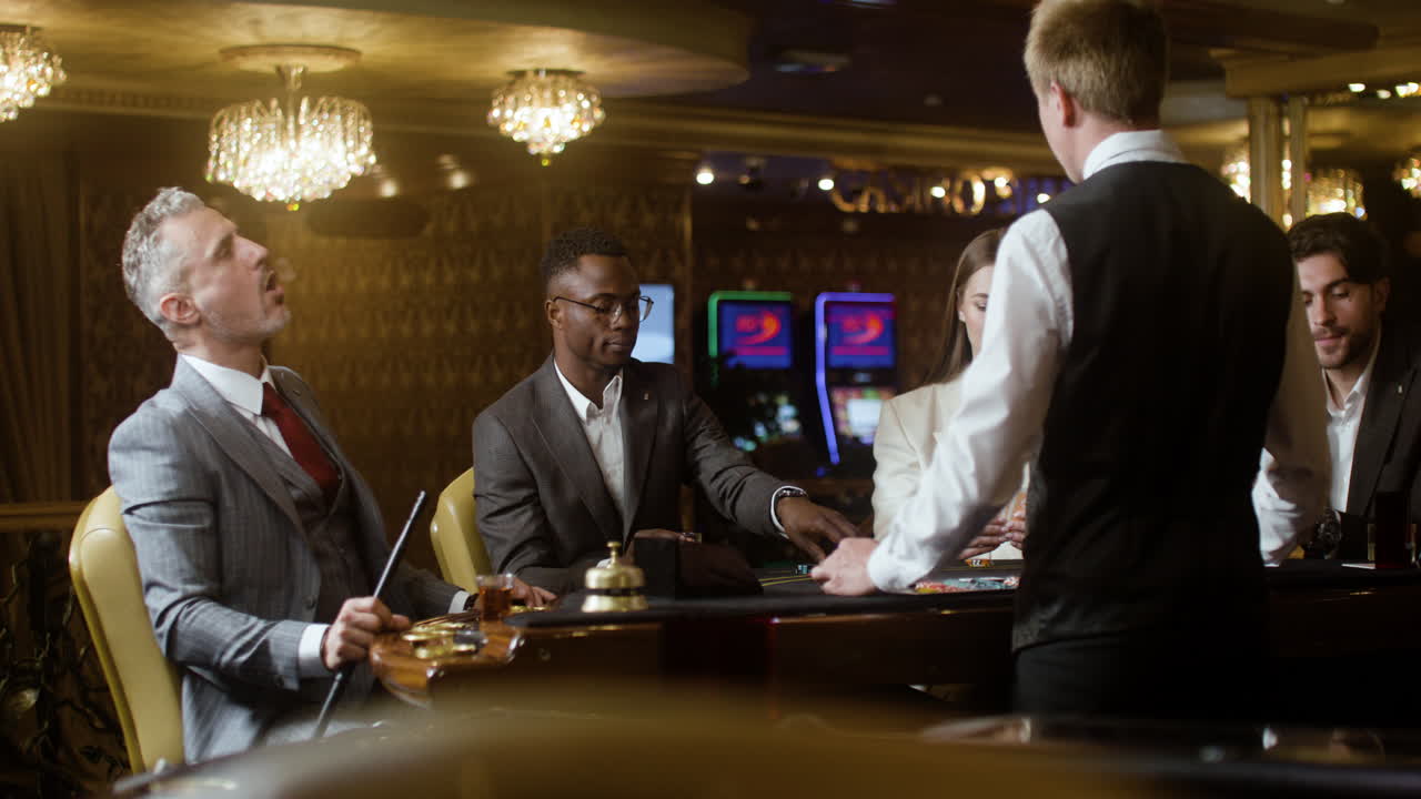 Poker players smoking and drinking in the casino.
