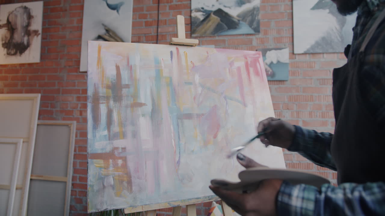 Artist Painting Abstract Art in Studio