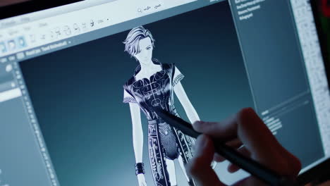 young man designing 3d character models with a digital pen