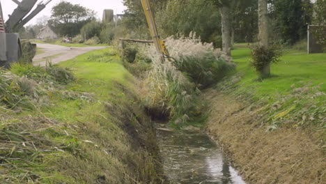 mandatory ditch cleaning in the netherlands to prevent flooding