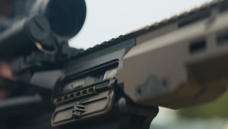 close-up of ar-15 rifle with scope
