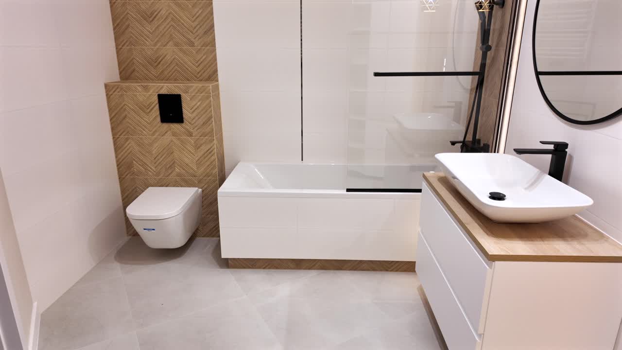 baño de lujo con luces blancas y color dorado