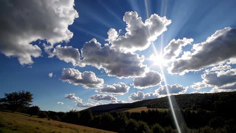 sunny day with clouds and hills