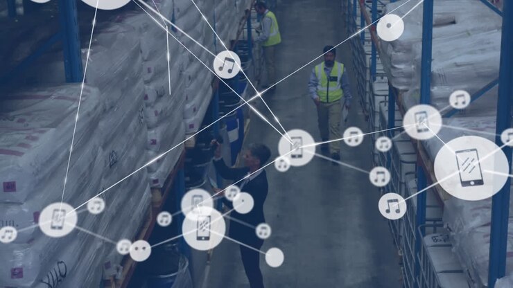 Animation of network of connections with icons over diverse men working in warehouse
