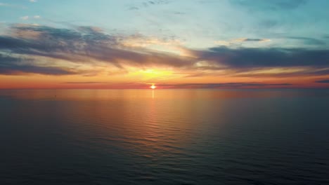 Aerial-View-of-the-Baltic-Sea-at-Sunset,-Pavilosta,-Latvia