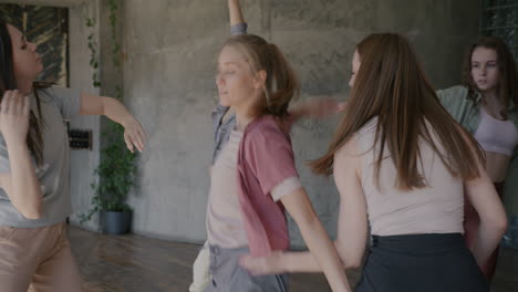 group of young women practicing contemporary dance