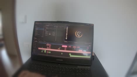 pov video editing from home computer work in daylight on small bedroom table