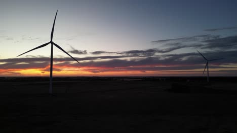 Silhouette-of-wind-turbines-spinning-at-sunset,-Esperance-area-in-Western-Australia