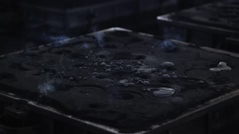 safety first concept, casting of iron in a craft factory for the preparation of different pieces such as sewer covers.mp415 safety first concept, foundry - molten metal poured from ladle