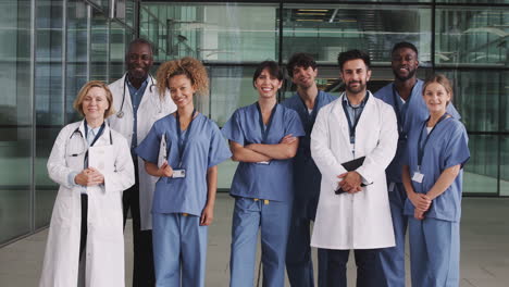 Portrait-Of-Medical-Team-Standing-In-Modern-Hospital-Building