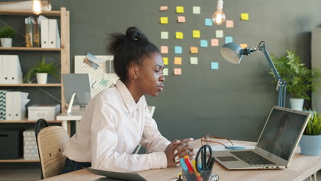 woman in video call at office
