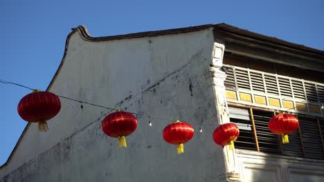 red lantern hanging at the old heritage