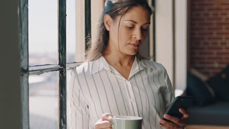 Woman,-phone-and-coffee-thinking-at-window