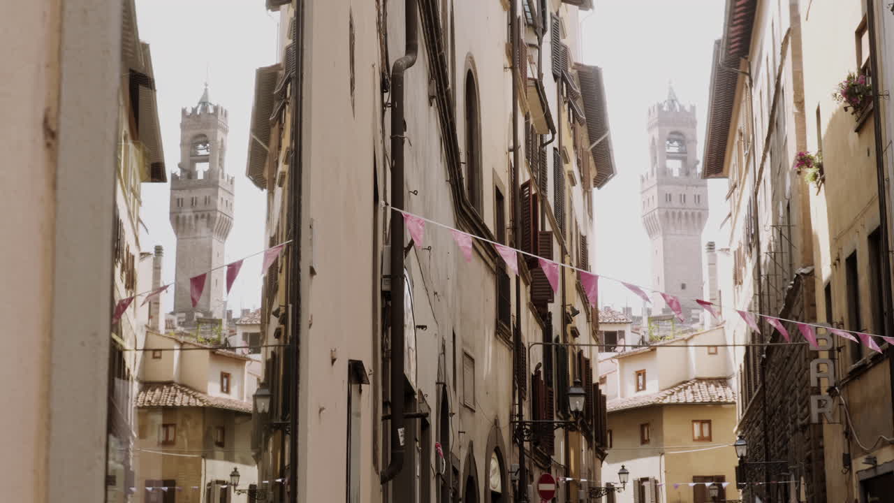 Narrow Street with Historic Buildings in Florence, Italy