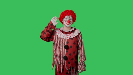 clown waving on green screen