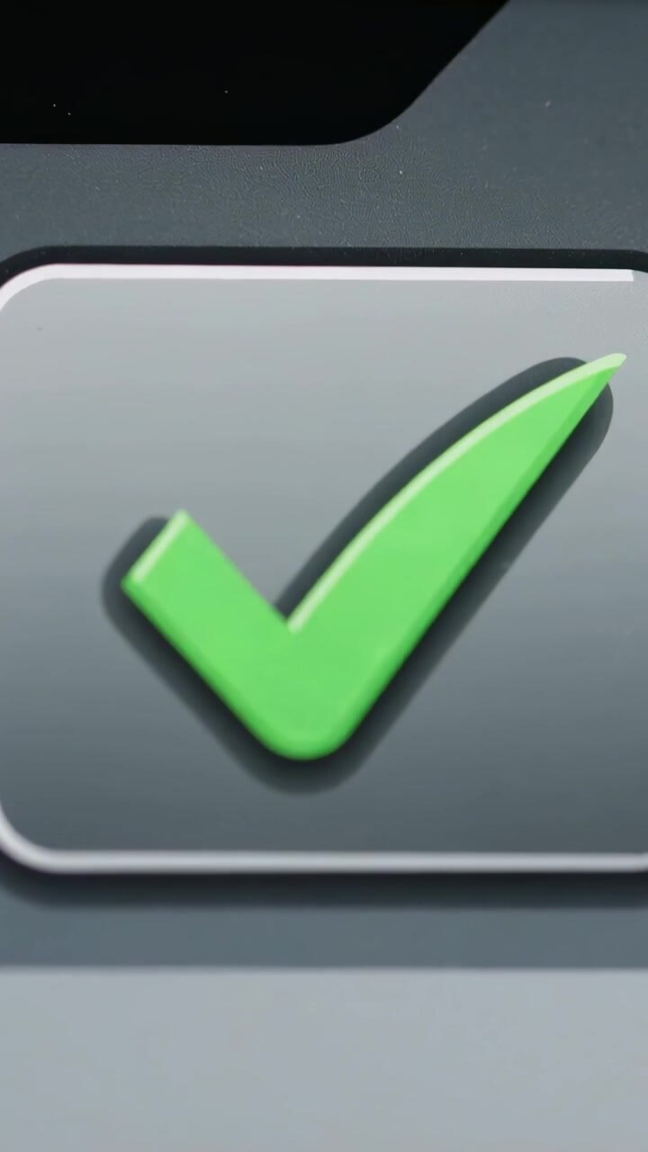 Vertical video: Camera nudging raised lime green check mark shifting on gray button for UI