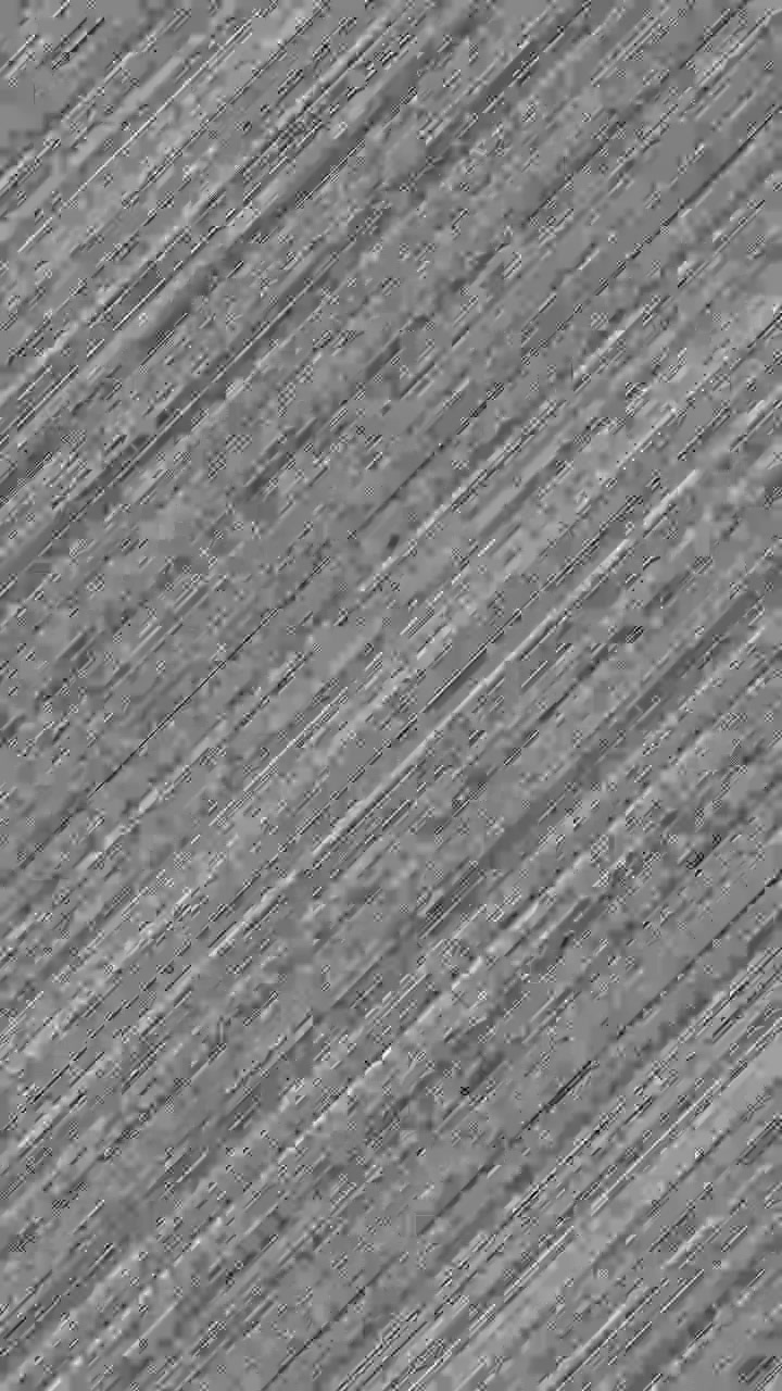 Vertical format monochrome background with fast moving diagonal lines creating a motion or speed effect