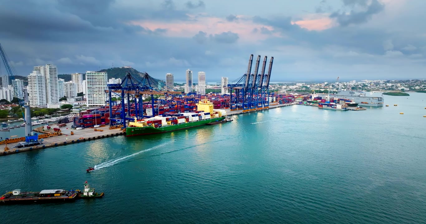 Docked vessel loaded with containers at Cartagena port, aerial view