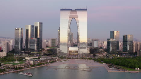 cbd buildings by the lake. aerial in suzhou, china.