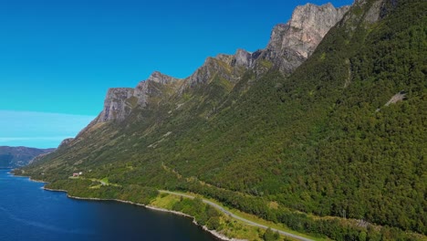 aerial over road near syvdefjorden in the vanylven municipality, norway