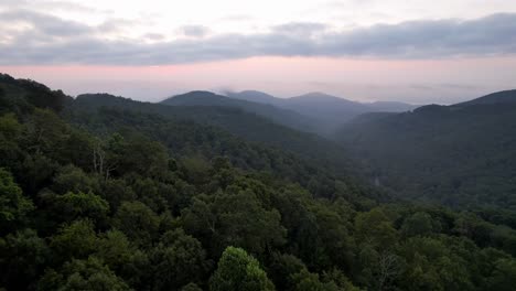 treetop aerial at sunrise along the blue ridge mountain range near boone and blowing rock nc, north carolina