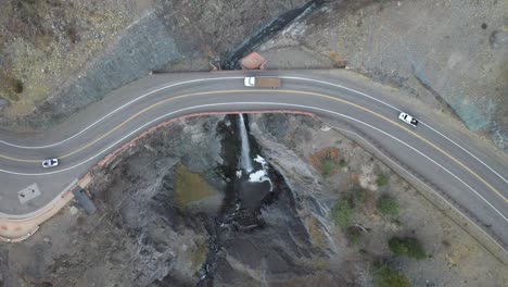 Overhead-drone-video-shot-of-Million-Dollar-Highway-in-Colorado-with-vehicles-driving