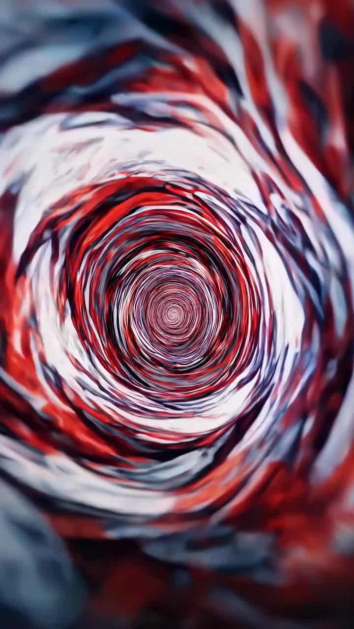 Kırmızı ve mavi tonlarında, merkezi bir açıdan yakalanmış dinamik, girdaplı bir vortex
