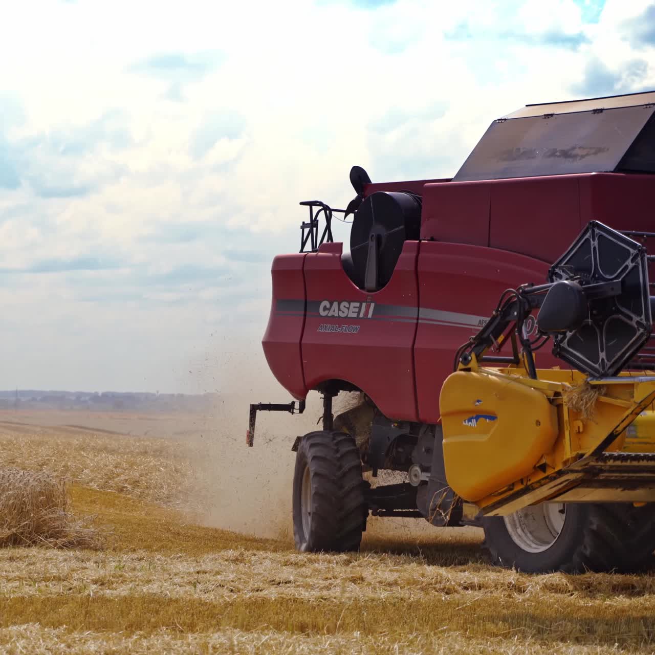 Harvesting machine working in field