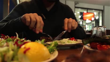 man eating dinner on the restaurant 1