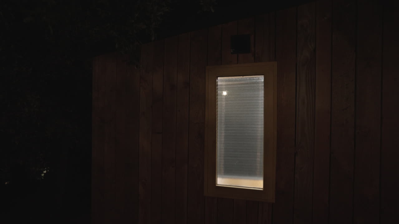 A building with a window at night